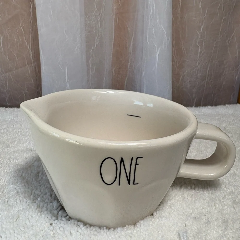 Rae Dunn Artisan Collection Measuring Cups. 4-Piece Set of White Ceramic Cups.